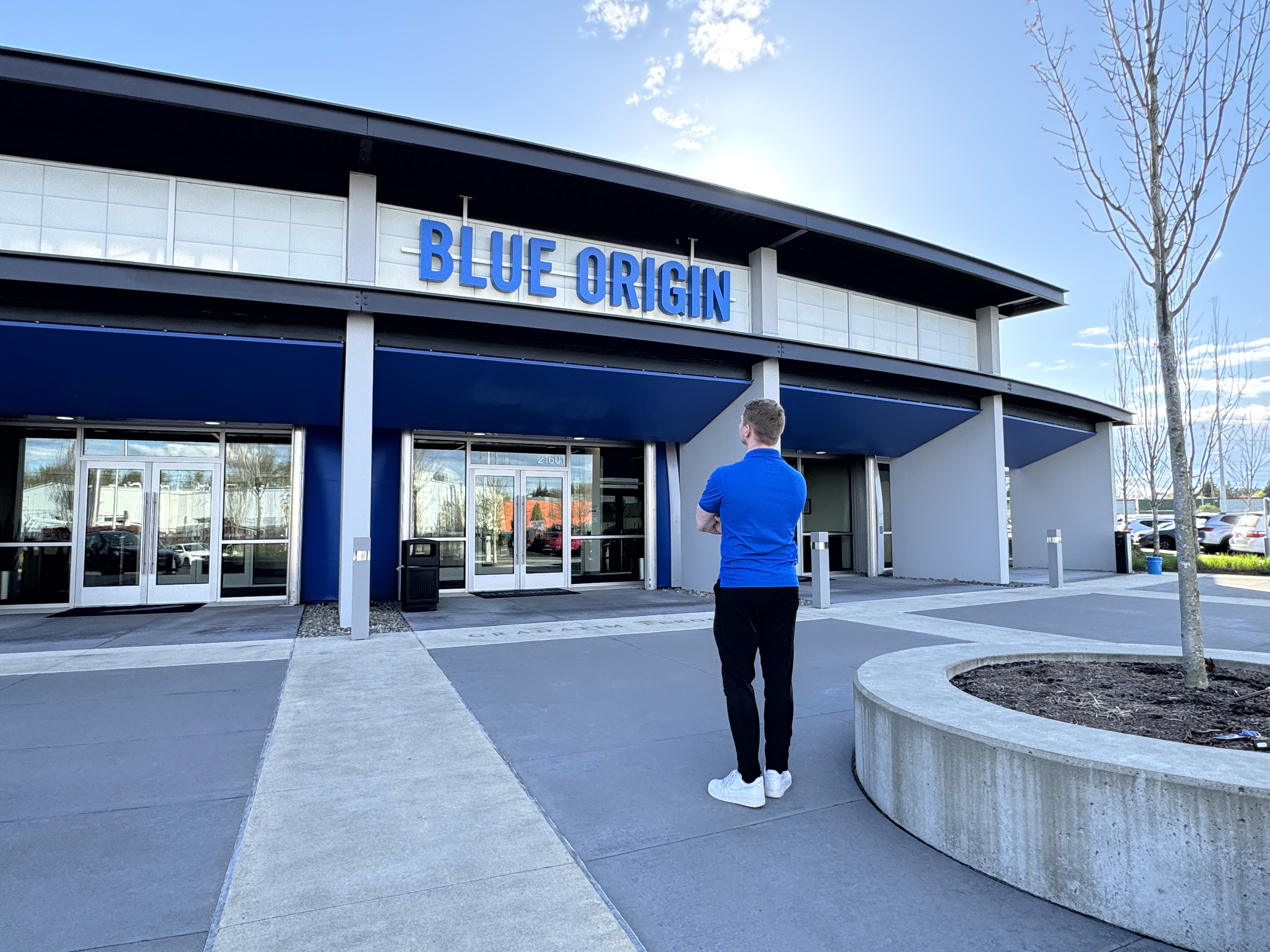 Standing in front of the Blue Origin building